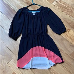 Navy blue dress with pink and white at the bottom